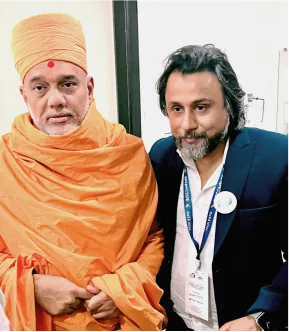Pinakin Soni with a guest at an event